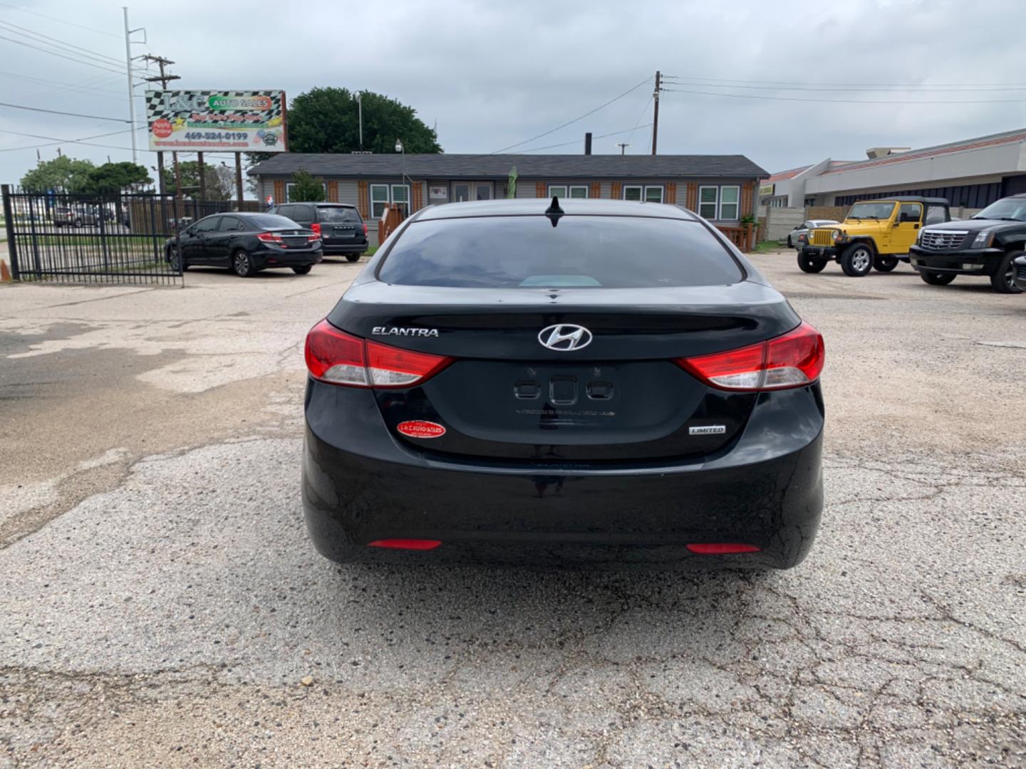 2012 Black Hyundai Elantra GLS A/T (KMHDH4AE3CU) with an 1.8L L4 DOHC 16V engine, Automatic transmission, located at 1830 North Belt Line Road, Irving, TX, 75061, (469) 524-0199, 32.834373, -96.993584 - Photo#4